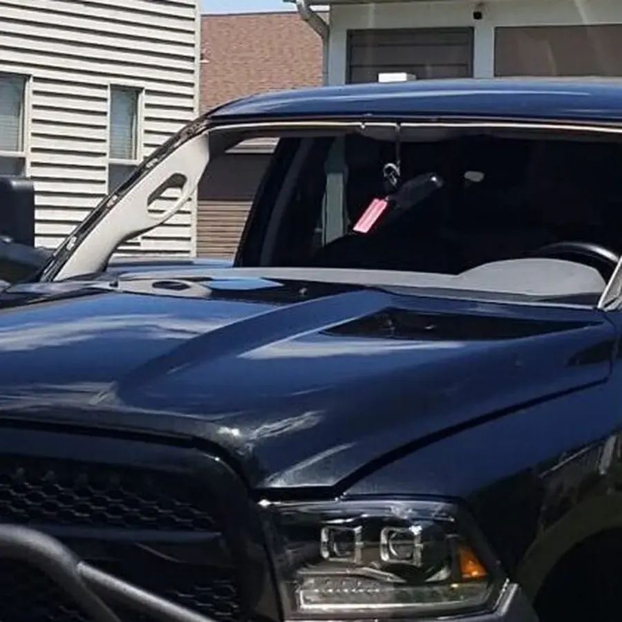 Before — RAM truck with shattered windshield removed